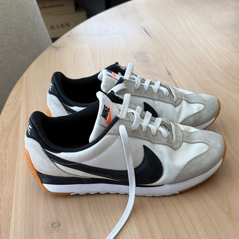 Nike Black and White Sneakers with Orange Highlights